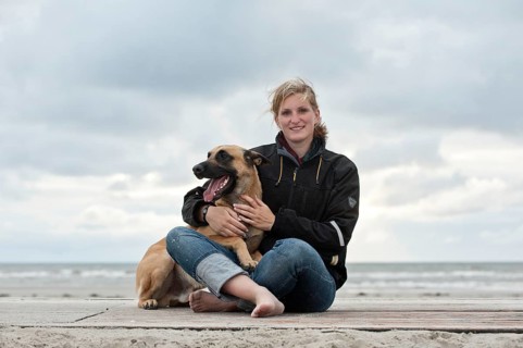 Woman with a Hollandse Herdershond