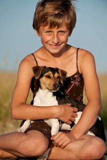Girl and a Dansk-Svensk Gardshund or Danish-Swedish Farmdog