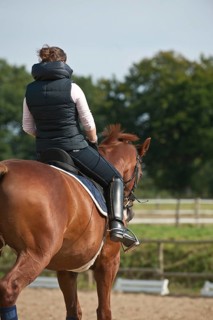 Woman riding a horse