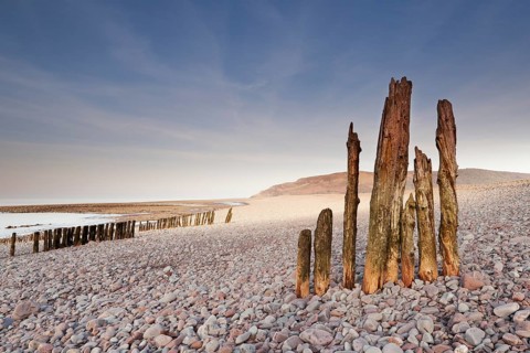 The remains of some old groynes on the beach from Porlock Weir