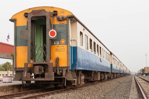 State railway train at station in Thailand