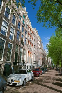 Historic buildings beside Keizersgracht canal in Amsterdam