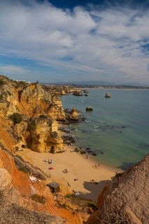 Praia do Camilo beach with Praia Dona Ana beach at back
