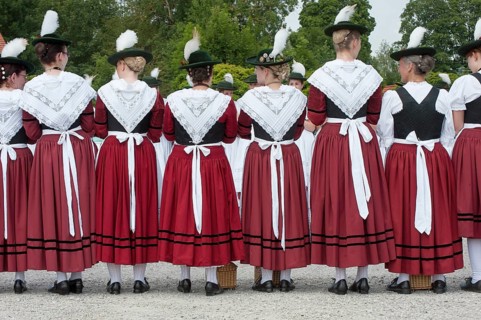 Women in traditional Bavarian costume forming a guard of honour for the entrance into the beer tent