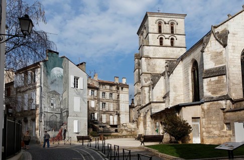 Saint Andre Church and mural Memoires du XXeme Siecle by Yslaire