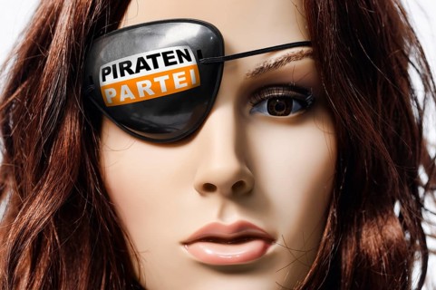 Shop-window mannequin wearing an eye patch with the logo of the Pirate Party of Germany