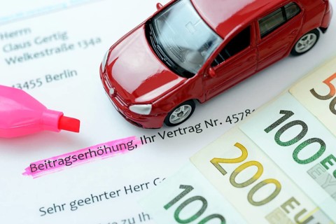 Car insurance letter and miniature car