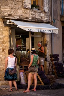 Tourists looking at display of lavender shop