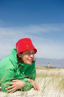 Woman lying on the beach