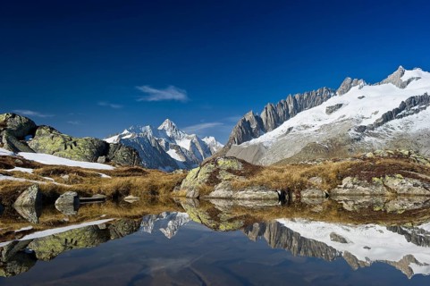 Small lake above the Aletsch Glacier and the Bernese Oberland