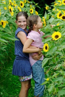Girls in a sunflower field