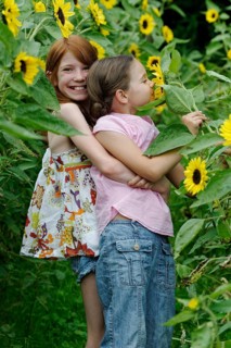 Girls in a sunflower field
