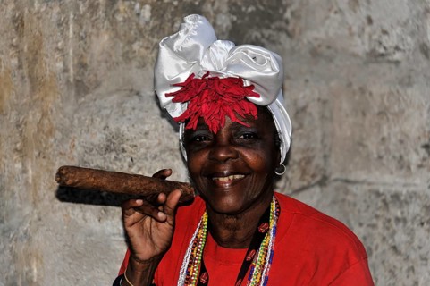 Cuban woman holding a cigar