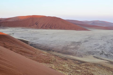 View from Dune 45 on a desert landscape with dunes at dawn