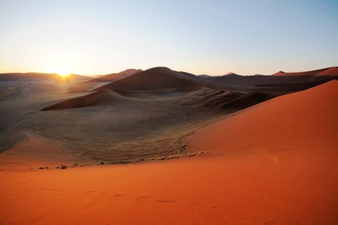 Sunrise view from Dune 45 on a desert landscape with dunes