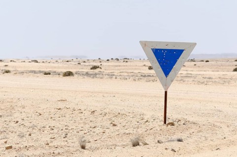 Weathered road sign