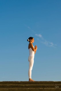 Young woman practising Hatha yoga