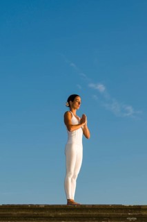 Young woman practising Hatha yoga
