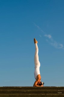 Young woman practising Hatha yoga