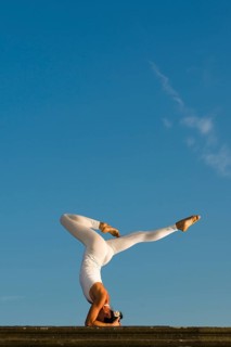 Young woman practising Hatha yoga