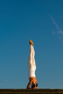 Young woman practising Hatha yoga