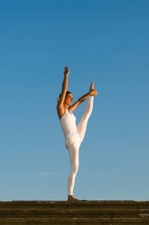 Young woman practising Hatha yoga