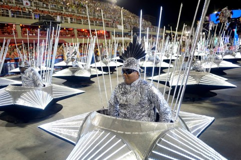 Wheelchair users take part in the parade of the samba school Inocentes de Belford Rocho