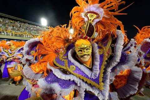 Man wearing a colourful costume