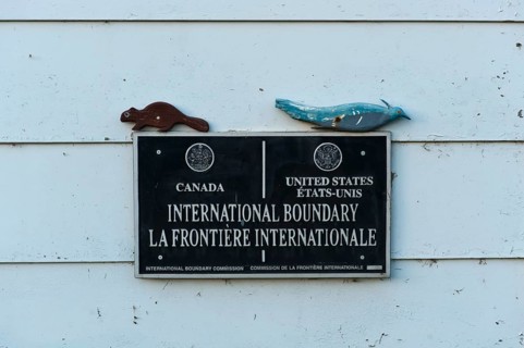 Sign at the border between Canada and the United States of America