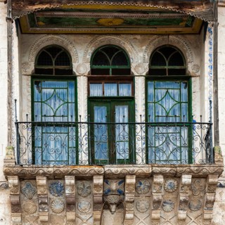 Windows of an old Greek house hotel