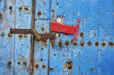 Old door with a padlock