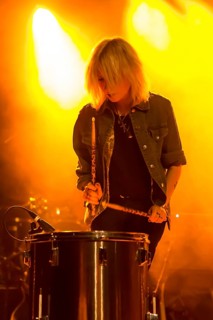 Sophie Diggelmann from the Swiss women's rock band Velvet Two Stripes performing live in the Schueuer concert hall