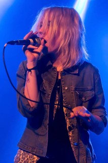 Sophie Diggelmann from the Swiss women's rock band Velvet Two Stripes performing live in the Schueuer concert hall