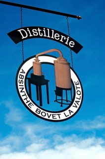 Hanging sign of the absinthe distillery Bovet La Valote