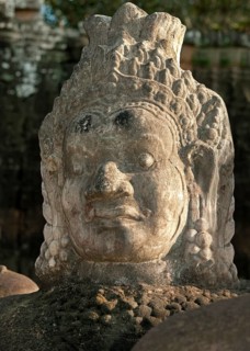 Detail of a figure from the right boundary of the access road to the south gate