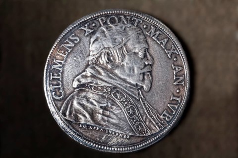 Antique silver coin with the portrait of Clement X. 1590 - 1676 or Emilio Altieri