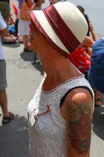 Woman wearing a Panama hat and a summer dress