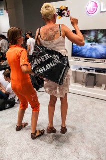 Mother and daughter playing a games console during the Gamescom 2012