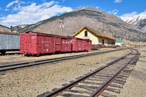 Historic train station with wagons of the Denver & Rio Grande Western Railroad Company