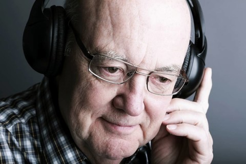 Senior wearing headphones