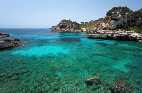 Rock-lined bay of Calo des Moro