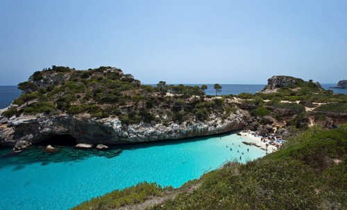 Rock-lined bay and beach of Cala S'Almunia