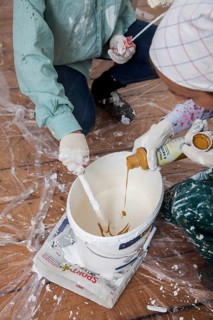 Mother and daughter renovating a room