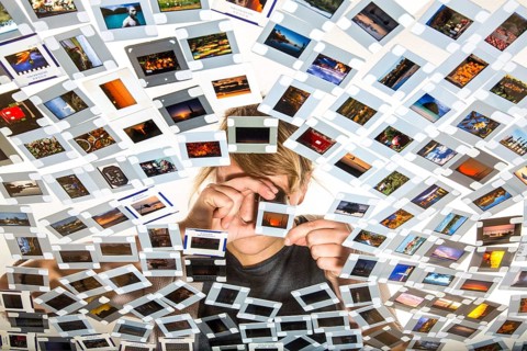 Young woman sorting mounted slides