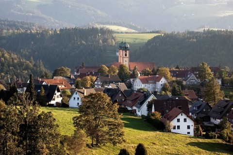 View of the village of St Maergen with the monastery church in the evening light