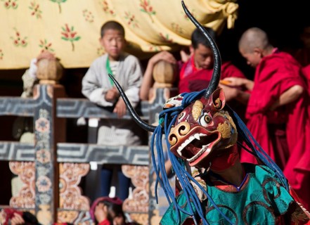 Masked dancer at Tsechu festival