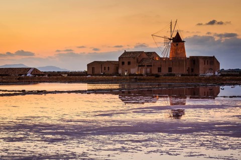 Sunset at the old saltworks in the Laguna dello Stagnone near Trapani