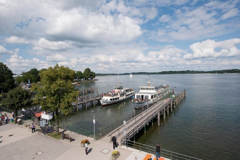 Landing stage with a steamboat on lake Chiemsee