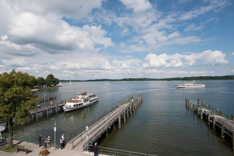 A steamboat at a landing stage on lake Chiemsee