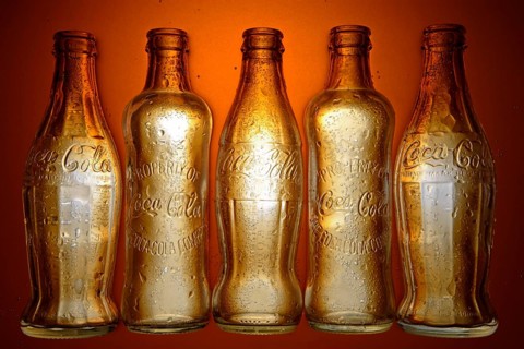 Various historic Coca-Cola bottles